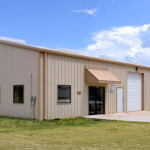 Tan steel office and warehouse building