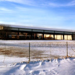 Covered cattle pen with wall skirt in snow