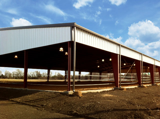 Covered horseback riding arena with skirt