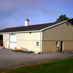 Barndominium residential living quarters with garage