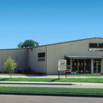 Tan steel storefront building