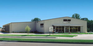 RHINO metal building serving as a truck accessory business.