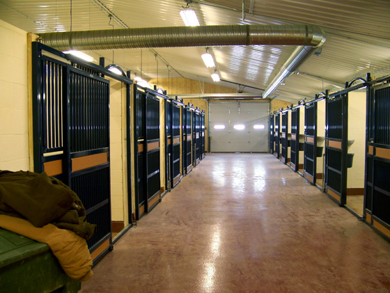 Interior of a steel building horse stable