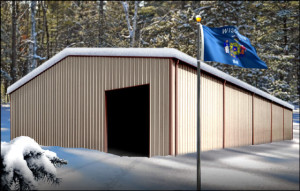 tan metal building with reddish-brown trim before a snow-covered forest in Wisconsin