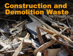 Pile of broken lumber pieces is all that remains after a building is destroyed in a natural disaster