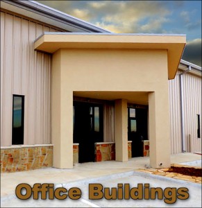 Close-up of a covered entrance to a metal building trimmed with stone wainscot