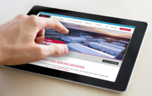 Hand poised over electronic tablet with RHINO website on it.