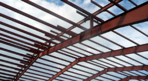 Image through the roof of a steel-framed industrial structure.