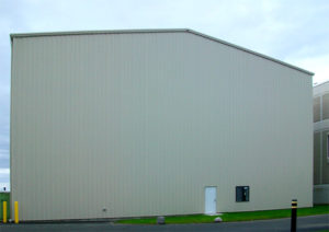 Image of a metal building with exceptionally tall eave height.